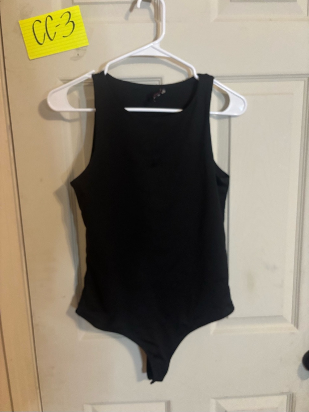 Dress Forum Black ' Sleeveless One-Piece Bodysuit